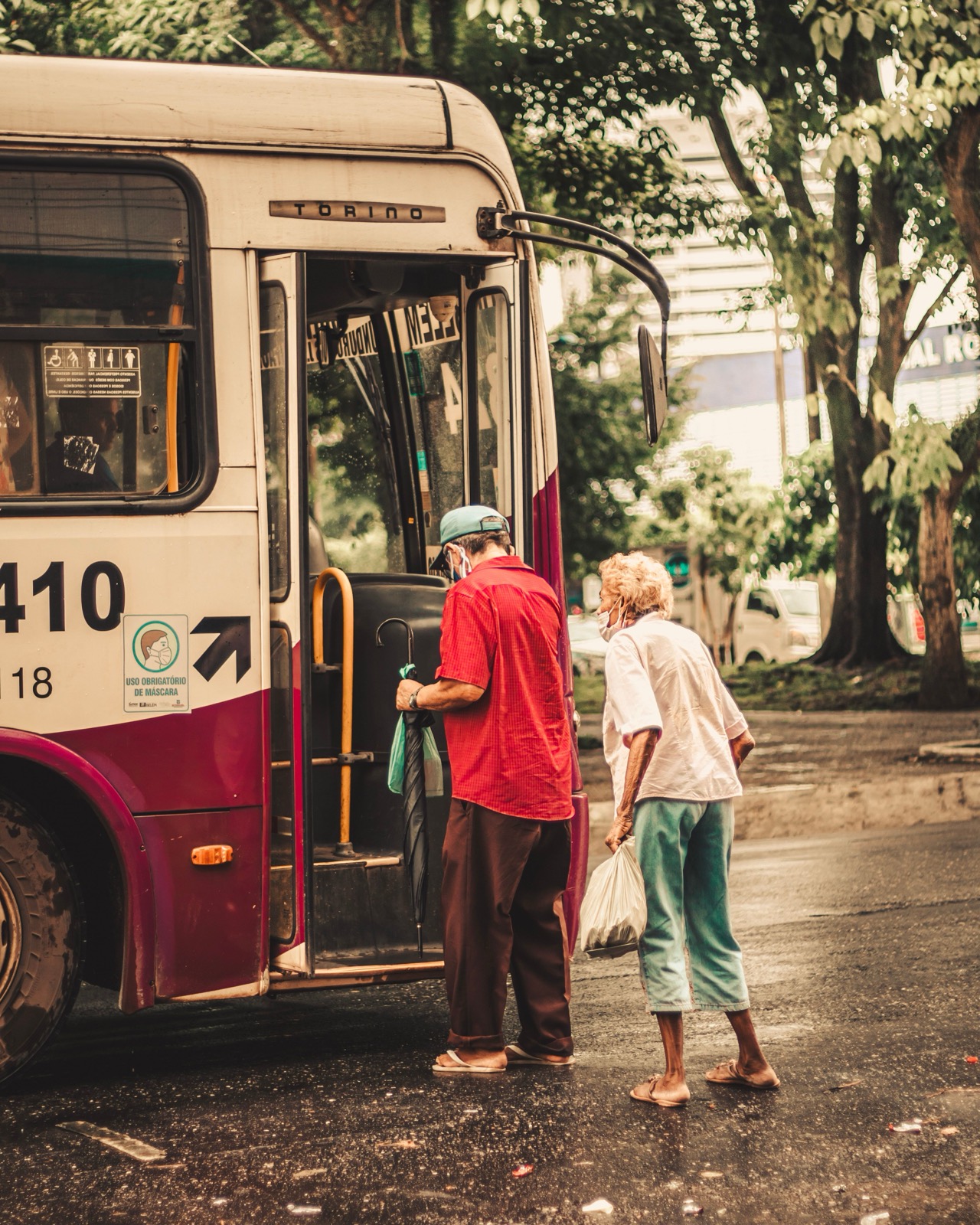 People board a city bus